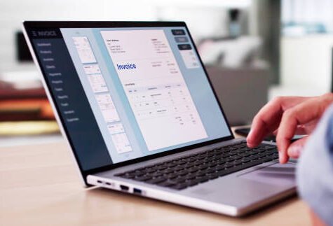 E Invoice Business Management. Accountant Using Electronic Invoice