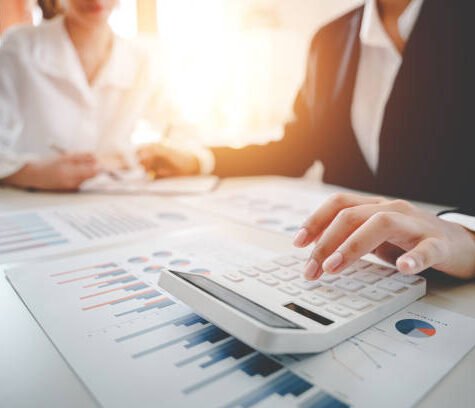 The financiers are calculating personal taxes for their customers. The financiers are calculating personal taxes for their customers.