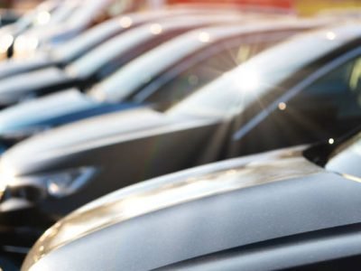 Close up of brand new cars at a car dealership Close up of brand new cars at a car dealership